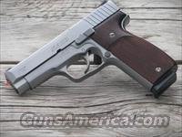 KAHR T9 Tactical 9MM with Novak low mount NIGHT SIGHTS and HOUGE WOOD GRIPS 100 LAYAWAY Img-1
