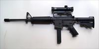 COLT AR 15 MODEL R6450 9MM CARBINE WITH GREEN BOX AND 4 X 20 SCOPE