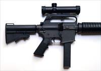 COLT AR 15 MODEL R6450 9MM CARBINE WITH GREEN BOX AND 4 X 20 SCOPE