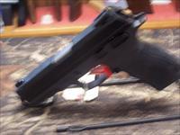 Taurus TH9 9mm 4.27 Hammer Fired Pistol, Black. NIB  Img-1