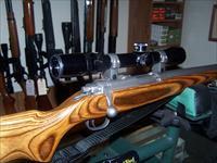 PRE-OWNED RUGER ALL WEATHER MODEL 77/22 W/SCOPE. 22 HORNET. EXCELLENT CONDITION Img-3