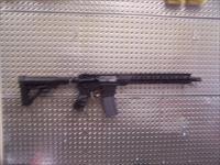 CUSTOM BUILT AR15. .223/5.56. LOTS OF GOOD STUFF AND WELL BUILT. NEVER BEEN FIRED!!!