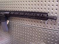 CUSTOM BUILT AR15. .223/5.56. LOTS OF GOOD STUFF AND WELL BUILT. NEVER BEEN FIRED!!!