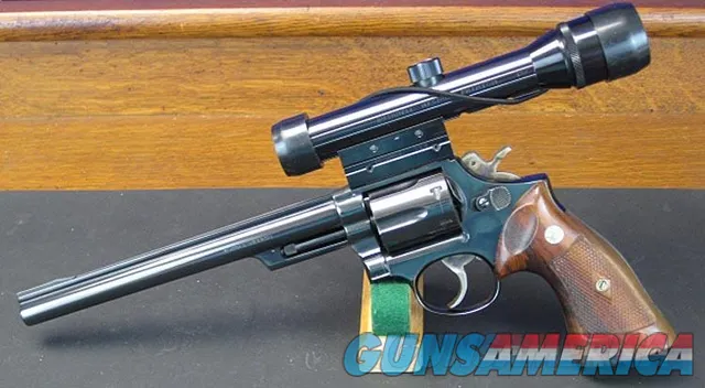 S&W MODEL 53-2 IN .22 REMINGTON JET WITH 8 3/8 INCH BARREL, BUSHNELL SCOPE AND BASE, HUNTER LEATHER HOLSTER AND 5 BOXS OF FACTORY ORIGINAL REMINGTON AMMUNITON. Img-29