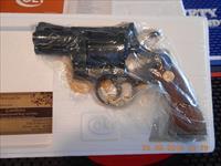 Colt Python 2 1/2" Unfired Walnut grips, Complete