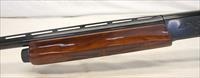 Remington 1100 Semi-automatic Shotgun  12Ga for 2 3/4 Shells  28 VENTED RIB Barrel  Engraved Receiver Img-5