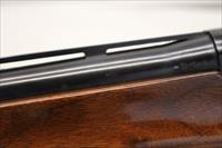 Remington 1100 Semi-automatic Shotgun  12Ga for 2 3/4 Shells  28 VENTED RIB Barrel  Engraved Receiver Img-6