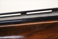 Remington 1100 Semi-automatic Shotgun  12Ga for 2 3/4 Shells  28 VENTED RIB Barrel  Engraved Receiver Img-7