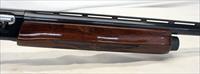 Remington 1100 Semi-automatic Shotgun  12Ga for 2 3/4 Shells  28 VENTED RIB Barrel  Engraved Receiver Img-13