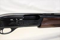 Remington 1100 Semi-automatic Shotgun  12Ga for 2 3/4 Shells  28 VENTED RIB Barrel  Engraved Receiver Img-19