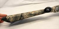 Thompson Center OMEGA In Line Blackpowder Rifle  .50 Cal  Stainless Barrel  Synthetic Camo Stock Img-2