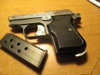 FIE TITAN 25 ACP two tone black grips