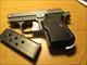FIE TITAN 25 ACP two tone black grips