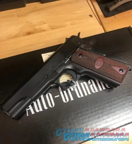 Auto-Ordinance 1911A1 blued #80 with wood grips