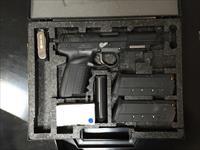 FNH 5.7 IOM with round trigger guard