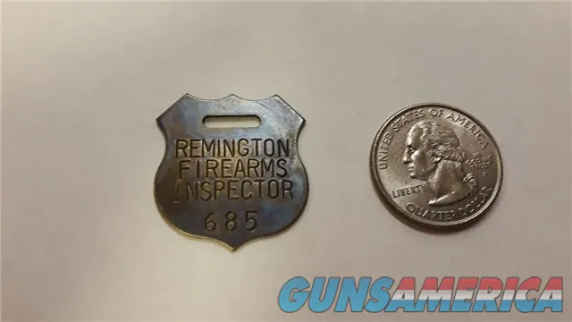 Remington Firearms Inspector Tag Brass
