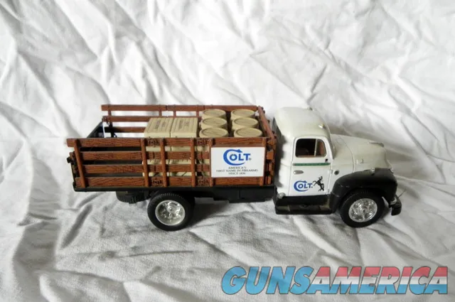 COLT FIREARMS Diamond-T Stake Truck 1/34 Scale Img-1