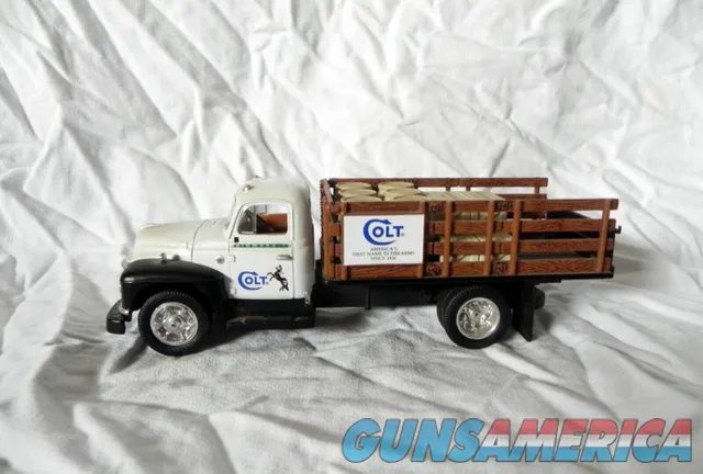 COLT FIREARMS Diamond-T Stake Truck 1/34 Scale Img-9