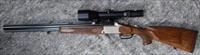 Blaser 700/88 in 12 gauge and 7x65R with scope