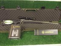 Remington 700 ADl Stainless Steel 30-06 w/Leupold VX-Freedom