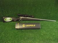 Remington 700 ADl Stainless Steel 243 win w/Leupold VX-Freedom Img-1