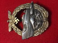 Kriegsmarine E-boat badge 2nd type. These are dye-struck featuring superb detail with a wide pin and makers mark. Img-1