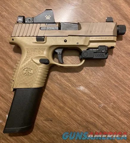 Unfired FN 509 tactical with extras