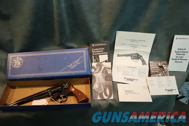 S+W 17-4 22LR 8 3/8" barrel w/box and papers
