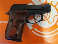 TAURUS MODEL 22 WITH ROSEWOOD GRIPS .22 LR PISTOL