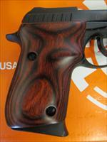 TAURUS MODEL 22 WITH ROSEWOOD GRIPS .22 LR PISTOL