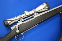 REMINGTON 700 CUSTOM RIFLE .300 WIN MAG w/LEUPOLD