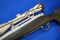 REMINGTON 700 CUSTOM RIFLE .300 WIN MAG w/LEUPOLD