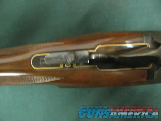  6880 Winchester 101 American Flyer Live Pigeon 12 gauge, 28 inch barrels, top barrel is fixed extra full/bottom barrel has a mod Winchester screw in chokes installed. gold wire receiver border, gold pigeon bottom of receiver, cased, all o Img-11