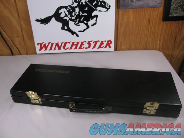 8062  Winchester Black Shotgun case with red interior, Will take up to 27.5 “ barrels.