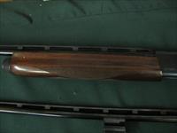 6516 Remington 1100 Classic Field 410 gauge, 2 barrels, 24 inch barrel and 26 inch barrel, skeet, ic and full screw in chokes and wrench. White diamond on pistol grip cap. 98 % or better condition. shot little, bores brite/shiny. Img-4