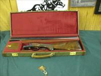 6801 Winchester 23 Classic 20 gauge 26 inch barrels ic/mod,vent rib, single select trigger, ejectors, pistol grip with cap, Winchester butt pad, all original, AAA Fancy marble cake highly figured walnut, correct Winchester box serialized to Img-3