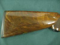 6801 Winchester 23 Classic 20 gauge 26 inch barrels ic/mod,vent rib, single select trigger, ejectors, pistol grip with cap, Winchester butt pad, all original, AAA Fancy marble cake highly figured walnut, correct Winchester box serialized to Img-6