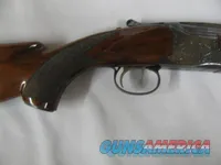 7558 Winchester 101 field 28 gauge 28 inch barrels, skeet/skeet, 99% condition, vent rib, pistol grip with cap, ejectors, Decelerator pad 14 1/2 lop, opens and closes tite, bores are brite and shiny,red front site, middle site is brass. exc