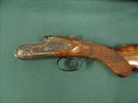 6805 Rizzini Artimus small action 28 gauge 30 inch barrels,sk is mod im full wrench papers, like new, 99% sideplates, wood butt plate, case colored receiver, vent rib ejectors, single select trigger, schnabel forend. round knob, TIGER STRIP Img-3
