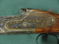 6805 Rizzini Artimus small action 28 gauge 30 inch barrels,sk is mod im full wrench papers, like new, 99% sideplates, wood butt plate, case colored receiver, vent rib ejectors, single select trigger, schnabel forend. round knob, TIGER STRIP Img-4