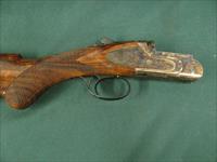 6805 Rizzini Artimus small action 28 gauge 30 inch barrels,sk is mod im full wrench papers, like new, 99% sideplates, wood butt plate, case colored receiver, vent rib ejectors, single select trigger, schnabel forend. round knob, TIGER STRIP Img-7