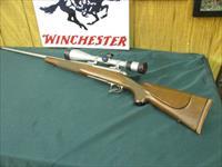 7227 Winchester model 70 300 Win Mag stainless steel, Zeiss 6.5x 20x50 Conquest target turrets,muzzle brake,regular recticle, cheek piece 99% condition,Winchester butt pad,s/n G7501x cant see any marks.THIS IS A REMARKABLE SET UP----ready t Img-1