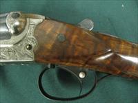 7153 Merkel model 260E 12ga 28bl ic mod Straight grip 1 1/2 x 2 1/2 x14 1/4 5lbs 12 oz scalloped receiver engraved by Herbert Wohlmuth cocking indicators ejectors,side clipped barrels, mfg 2001,2duck/pheaseant deep engraved silver receiver, Img-5
