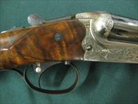 7153 Merkel model 260E 12ga 28bl ic mod Straight grip 1 1/2 x 2 1/2 x14 1/4 5lbs 12 oz scalloped receiver engraved by Herbert Wohlmuth cocking indicators ejectors,side clipped barrels, mfg 2001,2duck/pheaseant deep engraved silver receiver, Img-12