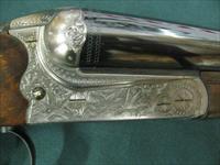 7153 Merkel model 260E 12ga 28bl ic mod Straight grip 1 1/2 x 2 1/2 x14 1/4 5lbs 12 oz scalloped receiver engraved by Herbert Wohlmuth cocking indicators ejectors,side clipped barrels, mfg 2001,2duck/pheaseant deep engraved silver receiver, Img-15
