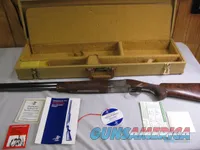 7749 Winchester 101 Pigeon XTR 12 gauge 27 inch barrel 2 3/4 inch chambers skeet, Schnabel forend, OIL FINISHED, correct box, papers and hang tag,complete set, AS NEW IN CASE, MFG FOR EUROPEAN MARKET. Winchester butt pad, AAA+++ very fancy 
