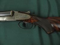 6533 L C Smith 2 E 12 gauge 30 inch barrels 2 3/4 chambers full/full, ejectors, Hunter One Trigger single trigger, lop white line pad 14 1/4,pistol grip horn cap,splinter 6533 L, leg of mutton case and wood cleaning rod, AA + Fancy Tiger St Img-3