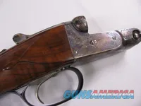 7909   Parker reproduction by Winchester DHE 20 gauge, 26 inch barrels, 2 ¾ chambers, ic/mod, fixed chokes, straight grip,  S