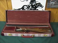 6558 Winchester 23 Grand Canadian 20 gauge 26 inch barrels,ic/mod, 3 inch chambers, STRAIGHT GRIP, raise relief gold maple leaves on bottom of receiver, oak leaf coin silver engraved receiver, Winchester butt pad, Winchester correct case, 9 Img-1