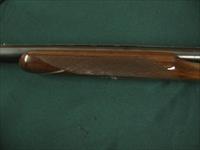 6733 Winchester 23 Pigeon XTR 12 gauge 26 barrels 3 inch chambers, vent rib, ejectors, single select trigger, beavertail, round knob, White line pad lop 14 1/4.coin silver rose and scroll receiver,opens closes tite,bores/brite/shiny. 98% co Img-4